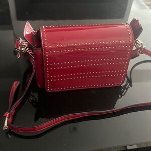Like New beautiful vegan red pattern crossbody bag
